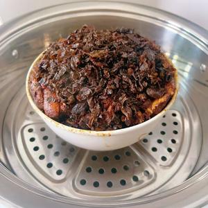 Steam over medium-low heat for 2 hours. The texture will become tender, sticky, and melt-in-your-mouth soft.