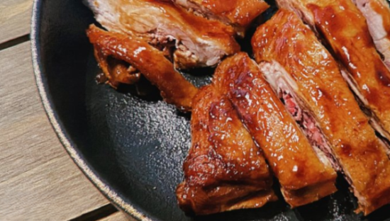Braised duck with plum sauce